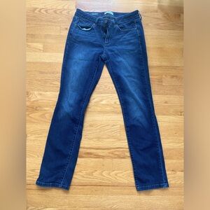 A pair of stylish and very blue jeans.